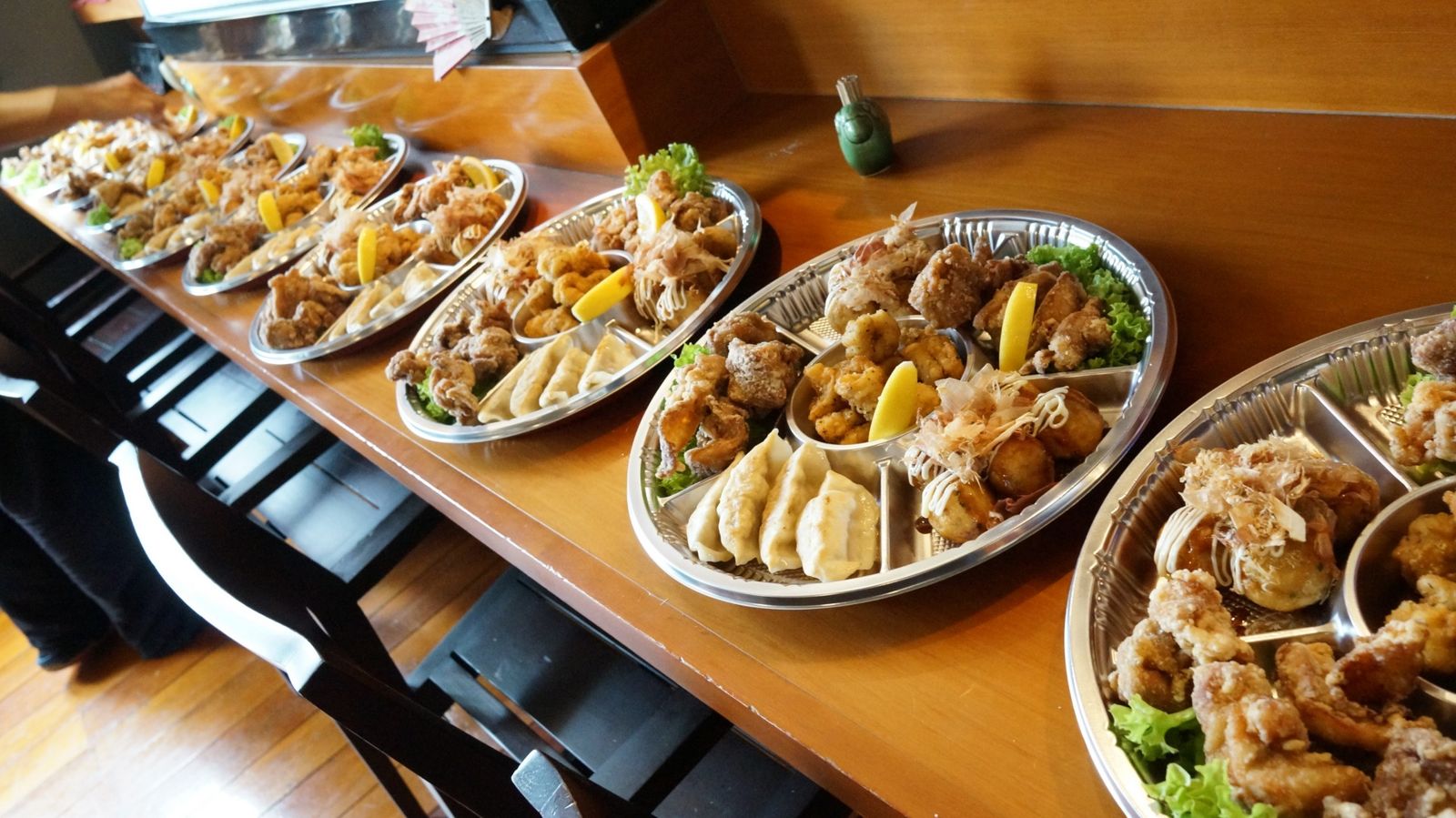 Finger food platters with karaage, gyoza and takoyaki